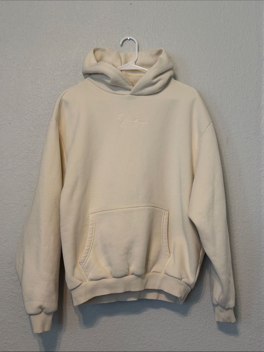 Karl Kani Cream Hoodie with Subtle Script Logo